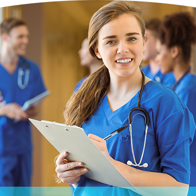 Nurse taking notes on clipboard