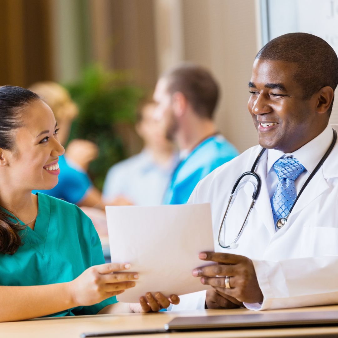 healthcare professionals sharing paper