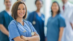 woman nurse posing proudly
